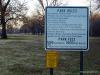 Baxter Springs Riverside Park - Park Rules - This sign at the entrance to Baxter Springs Riverside Park lists the rules for the park. Note that camping is not allowed within 30 feet of any shelter, and the tent camping rate is $5 per night.