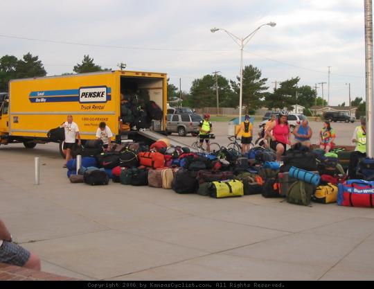 Biking Across Kansas 2006 - Loading the luggage truck in Johnson City.