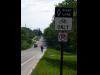 Olathe Bike Lane - A cyclist pedals along 143rd Street (Dennis Avenue) in Olathe, KS.