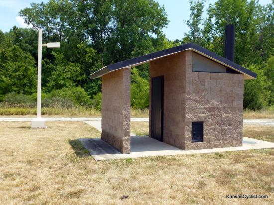 La Cygne Wildlife Area - Restroom - There is a single restroom available near the primitive camping area at La Cygne Wildlife Area. It is a pit toilet, but there is no water, and no electricity (despite the automatic lamp shown).