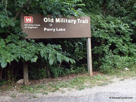 Old Military Trail Campground - Entrance Sign - This is the entrance sign for the Old Military Trail Campground at Perry Lake. Adjacent to the sign, out of frame, is the old park road, with a gate to keep motor vehicles out. Just walk your bike around the gate, then up the hill to the camping area.
